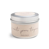 Candle tin with French text on a white background