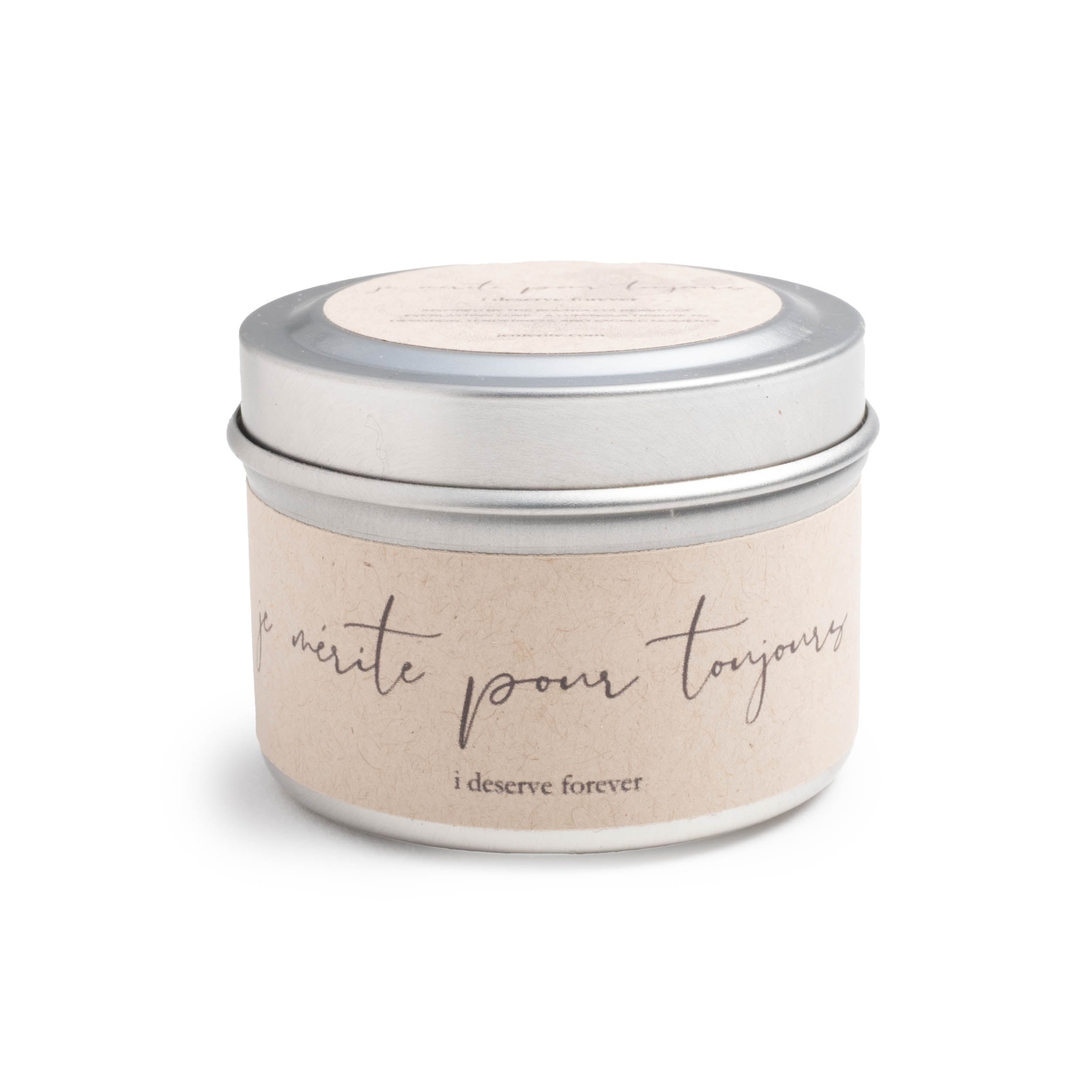 Candle tin with French text on a white background