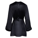 made in the softest washed silk charmeuse, this hidden button front shirt dress can be worn as a robe, pajama top or shirtdress, in and outside of the boudoir belt loop is subtly and discretely hidden behind the back placket complete with resting pockets wear with a je mérite coordinating bottom or chemise soft collar v-neck neckline subtle slits at sides removable belt sensual fit mini length washed 100% silk charmeuse designed in new york city, new york made in new york city, new york