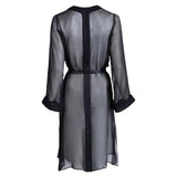 made from silk chiffon, this hidden button front nightdress can be worn open or fully buttoned, in and outside of the boudoir as a robe or a shirtdress (shirt dress) belt loop is subtly and discretely hidden behind the back placket complete with resting pockets wear with a je mérite coordinating bottom or chemise soft collar v-neck neckline subtle slits at sides sensual fit midi length 100% silk chiffon designed in new york city, new york made in new york city, new york