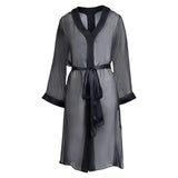 made from silk chiffon, this hidden button front nightdress can be worn open or fully buttoned, in and outside of the boudoir as a robe or a shirtdress (shirt dress) belt loop is subtly and discretely hidden behind the back placket complete with resting pockets wear with a je mérite coordinating bottom or chemise soft collar v-neck neckline subtle slits at sides sensual fit midi length 100% silk chiffon designed in new york city, new york made in new york city, new york