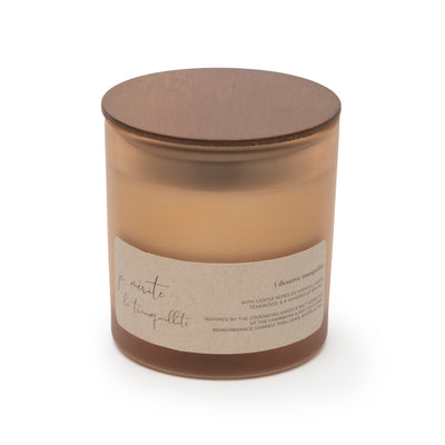Candle with a label on a white background