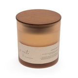 Candle with wooden lid on a white background