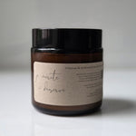 Jar of cream with a label on a white background