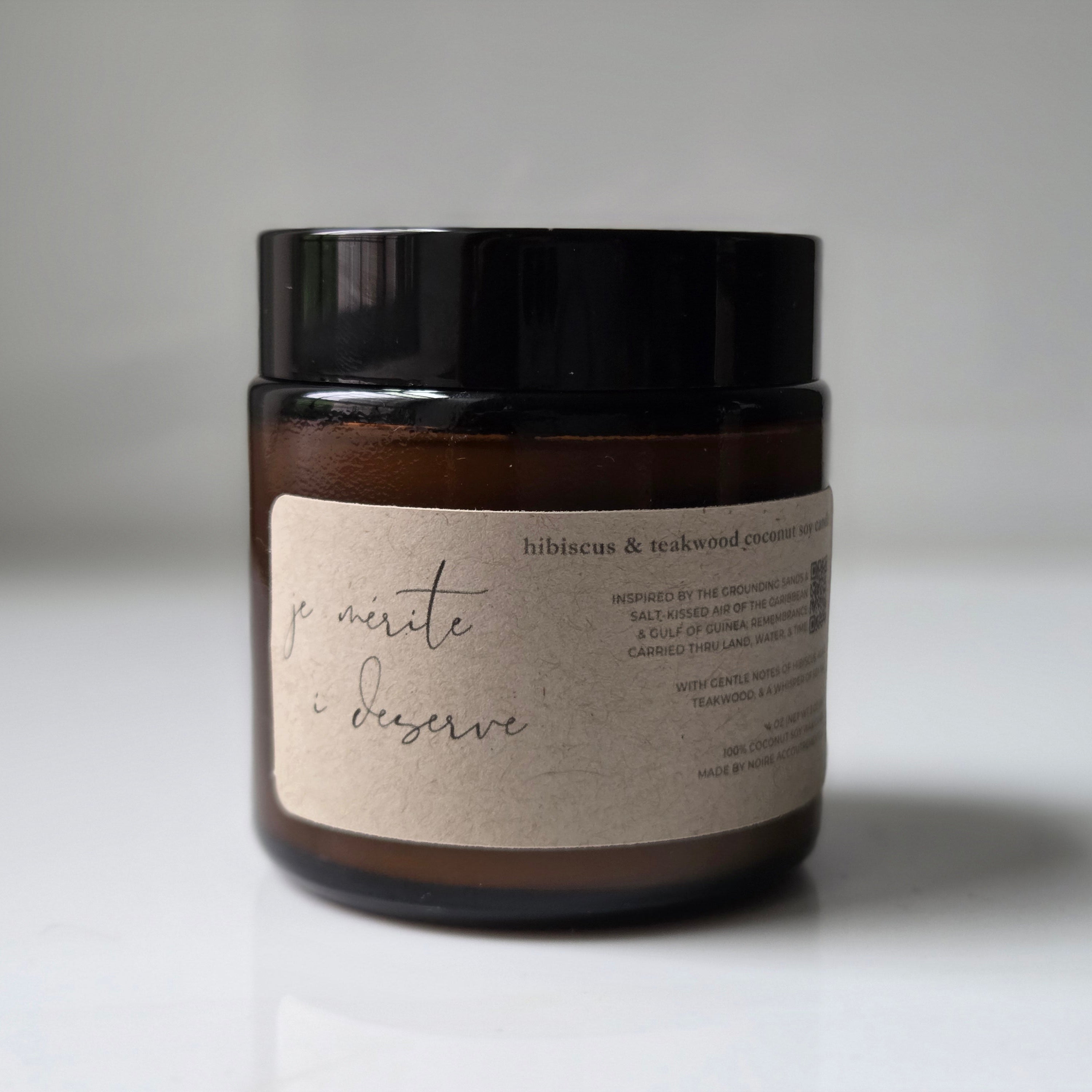 Jar of cream with a label on a white background