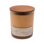 Candle with wooden lid on a white background