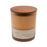 Candle with wooden lid on a white background
