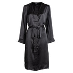 made in the softest washed silk charmeuse, this hidden button front night dress can be worn as a robe or shirtdress , in and outside of the boudoir  belt loop is subtly and discretely hidden behind the back placket  complete with resting pockets  wear with a je mérite coordinating bottom or chemise  soft collar v-neck neckline subtle slits at sides removable belt sensual fit midi length  washed 100% silk charmeuse  designed and made in new york city, new york - available in 0/2-20/22