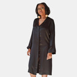 made in the softest washed silk charmeuse, this hidden button front night dress can be worn as a robe or shirtdress , in and outside of the boudoir  belt loop is subtly and discretely hidden behind the back placket  complete with resting pockets  wear with a je mérite coordinating bottom or chemise  soft collar v-neck neckline subtle slits at sides removable belt sensual fit midi length  washed 100% silk charmeuse  designed and made in new york city, new york - available in 0/2-20/22