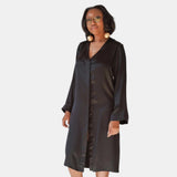 made in the softest washed silk charmeuse, this hidden button front night dress can be worn as a robe or shirtdress , in and outside of the boudoir  belt loop is subtly and discretely hidden behind the back placket  complete with resting pockets  wear with a je mérite coordinating bottom or chemise  soft collar v-neck neckline subtle slits at sides removable belt sensual fit midi length  washed 100% silk charmeuse  designed and made in new york city, new york - available in 0/2-20/22