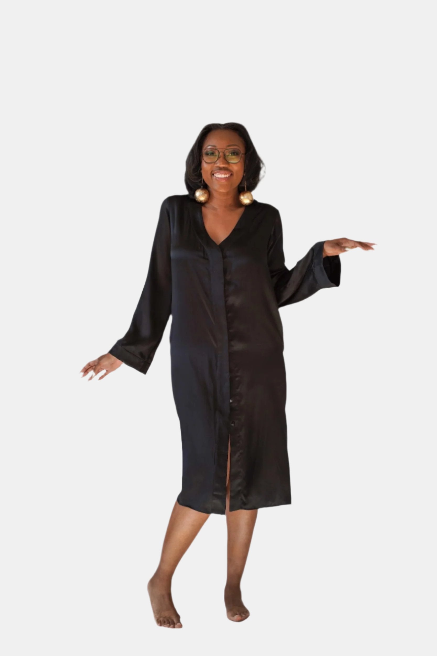 made in the softest washed silk charmeuse, this hidden button front night dress can be worn as a robe or shirtdress , in and outside of the boudoir  belt loop is subtly and discretely hidden behind the back placket  complete with resting pockets  wear with a je mérite coordinating bottom or chemise  soft collar v-neck neckline subtle slits at sides removable belt sensual fit midi length  washed 100% silk charmeuse  designed and made in new york city, new york - available in 0/2-20/22