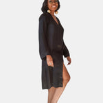 made in the softest washed silk charmeuse, this hidden button front night dress can be worn as a robe or shirtdress , in and outside of the boudoir  belt loop is subtly and discretely hidden behind the back placket  complete with resting pockets  wear with a je mérite coordinating bottom or chemise  soft collar v-neck neckline subtle slits at sides removable belt sensual fit midi length  washed 100% silk charmeuse  designed and made in new york city, new york - available in 0/2-20/22