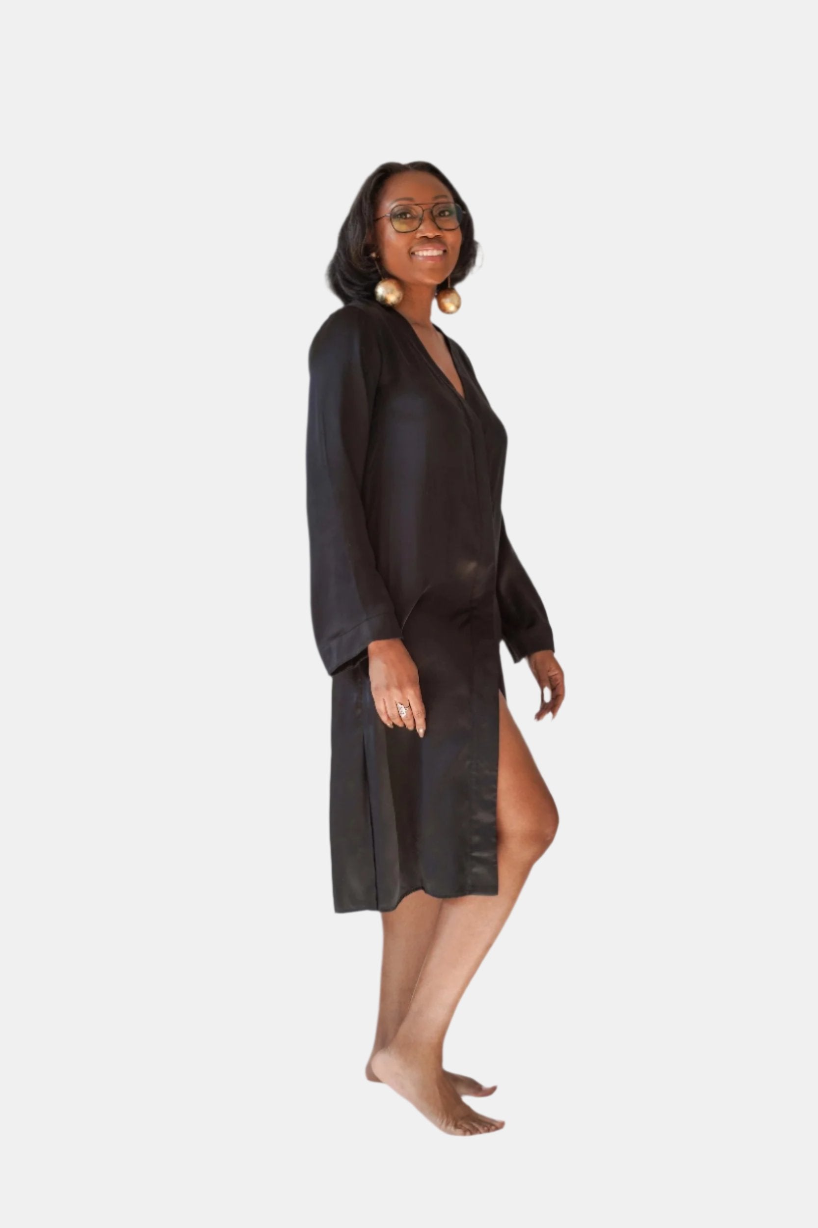 made in the softest washed silk charmeuse, this hidden button front night dress can be worn as a robe or shirtdress , in and outside of the boudoir  belt loop is subtly and discretely hidden behind the back placket  complete with resting pockets  wear with a je mérite coordinating bottom or chemise  soft collar v-neck neckline subtle slits at sides removable belt sensual fit midi length  washed 100% silk charmeuse  designed and made in new york city, new york - available in 0/2-20/22