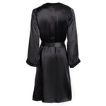 made in the softest washed silk charmeuse, this hidden button front night dress can be worn as a robe or shirtdress , in and outside of the boudoir  belt loop is subtly and discretely hidden behind the back placket  complete with resting pockets  wear with a je mérite coordinating bottom or chemise  soft collar v-neck neckline subtle slits at sides removable belt sensual fit midi length  washed 100% silk charmeuse  designed and made in new york city, new york - available in 0/2-20/22