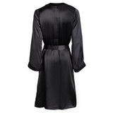 made in the softest washed silk charmeuse, this hidden button front night dress can be worn as a robe or shirtdress , in and outside of the boudoir  belt loop is subtly and discretely hidden behind the back placket  complete with resting pockets  wear with a je mérite coordinating bottom or chemise  soft collar v-neck neckline subtle slits at sides removable belt sensual fit midi length  washed 100% silk charmeuse  designed and made in new york city, new york - available in 0/2-20/22