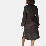 made in the softest washed silk charmeuse, this hidden button front night dress can be worn as a robe or shirtdress , in and outside of the boudoir  belt loop is subtly and discretely hidden behind the back placket  complete with resting pockets  wear with a je mérite coordinating bottom or chemise  soft collar v-neck neckline subtle slits at sides removable belt sensual fit midi length  washed 100% silk charmeuse  designed and made in new york city, new york - available in 0/2-20/22