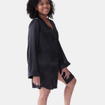 made in the softest washed silk charmeuse, this hidden button front shirt dress can be worn as a robe, pajama top or shirtdress, in and outside of the boudoir  belt loop is subtly and discretely hidden behind the back placket  complete with resting pockets  wear with a je mérite coordinating bottom or chemise  soft collar v-neck neckline subtle slits at sides removable belt sensual fit mini length  washed 100% silk charmeuse  designed and made in new york city, new york - available in 0/2-20/22