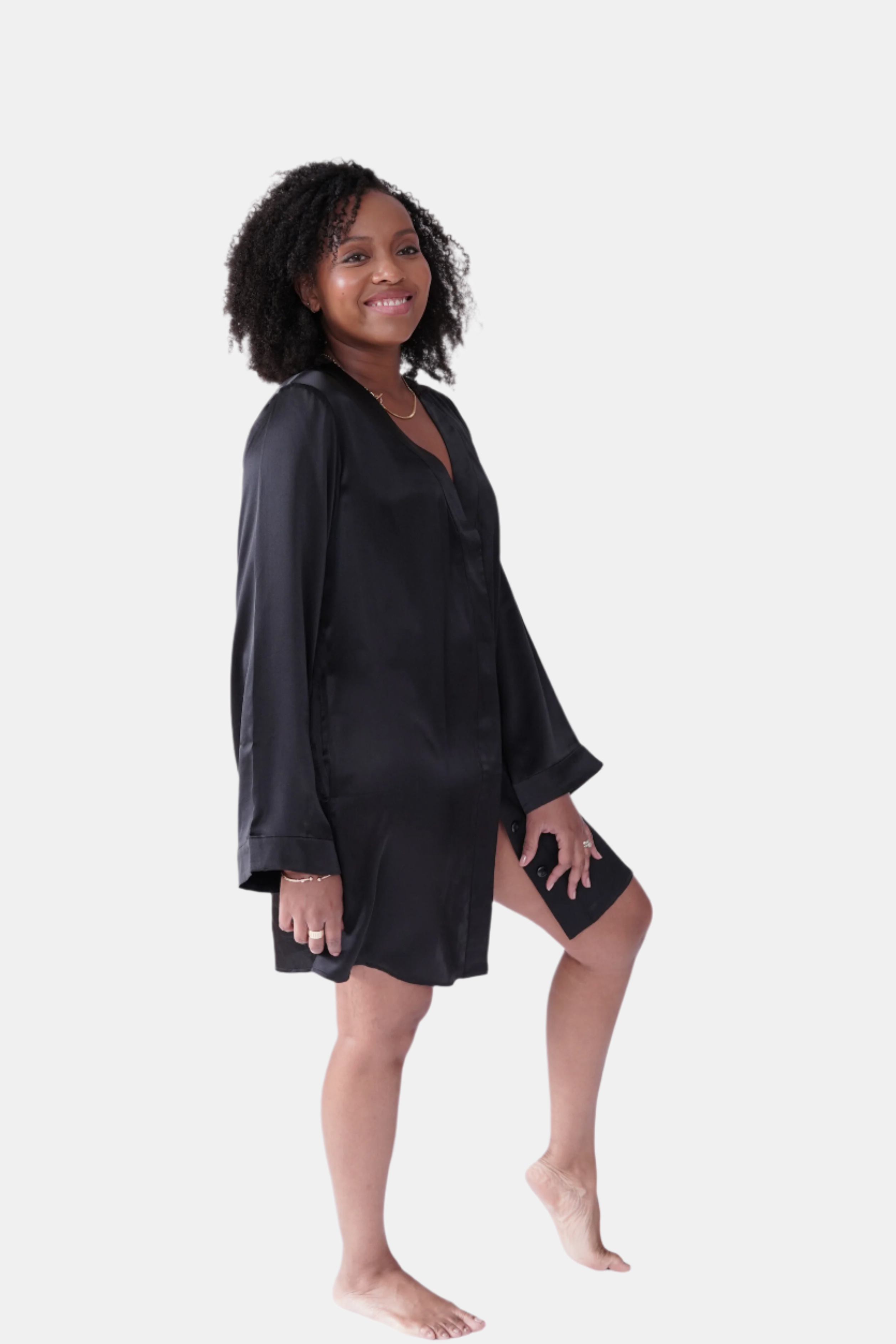made in the softest washed silk charmeuse, this hidden button front shirt dress can be worn as a robe, pajama top or shirtdress, in and outside of the boudoir  belt loop is subtly and discretely hidden behind the back placket  complete with resting pockets  wear with a je mérite coordinating bottom or chemise  soft collar v-neck neckline subtle slits at sides removable belt sensual fit mini length  washed 100% silk charmeuse  designed and made in new york city, new york - available in 0/2-20/22