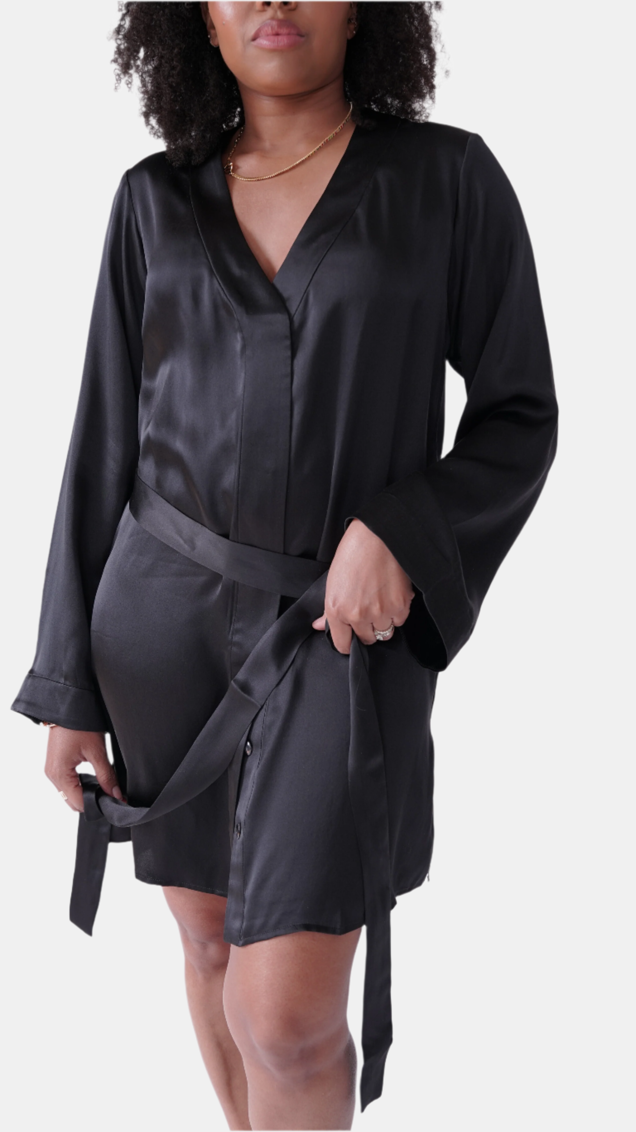 made in the softest washed silk charmeuse, this hidden button front shirt dress can be worn as a robe, pajama top or shirtdress, in and outside of the boudoir  belt loop is subtly and discretely hidden behind the back placket  complete with resting pockets  wear with a je mérite coordinating bottom or chemise  soft collar v-neck neckline subtle slits at sides removable belt sensual fit mini length  washed 100% silk charmeuse  designed and made in new york city, new york - available in 0/2-20/22