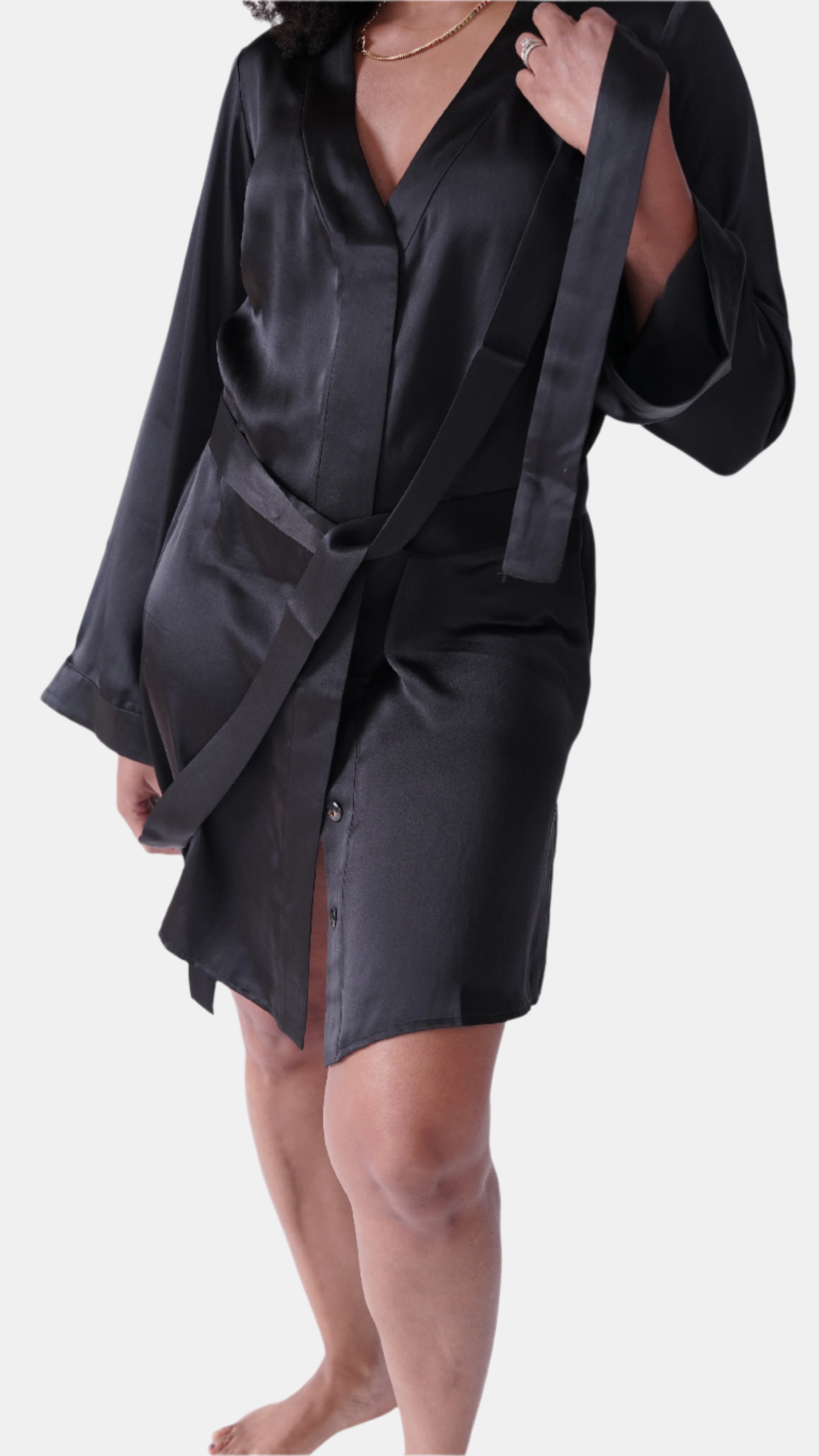 made in the softest washed silk charmeuse, this hidden button front shirt dress can be worn as a robe, pajama top or shirtdress, in and outside of the boudoir  belt loop is subtly and discretely hidden behind the back placket  complete with resting pockets  wear with a je mérite coordinating bottom or chemise  soft collar v-neck neckline subtle slits at sides removable belt sensual fit mini length  washed 100% silk charmeuse  designed and made in new york city, new york - available in 0/2-20/22