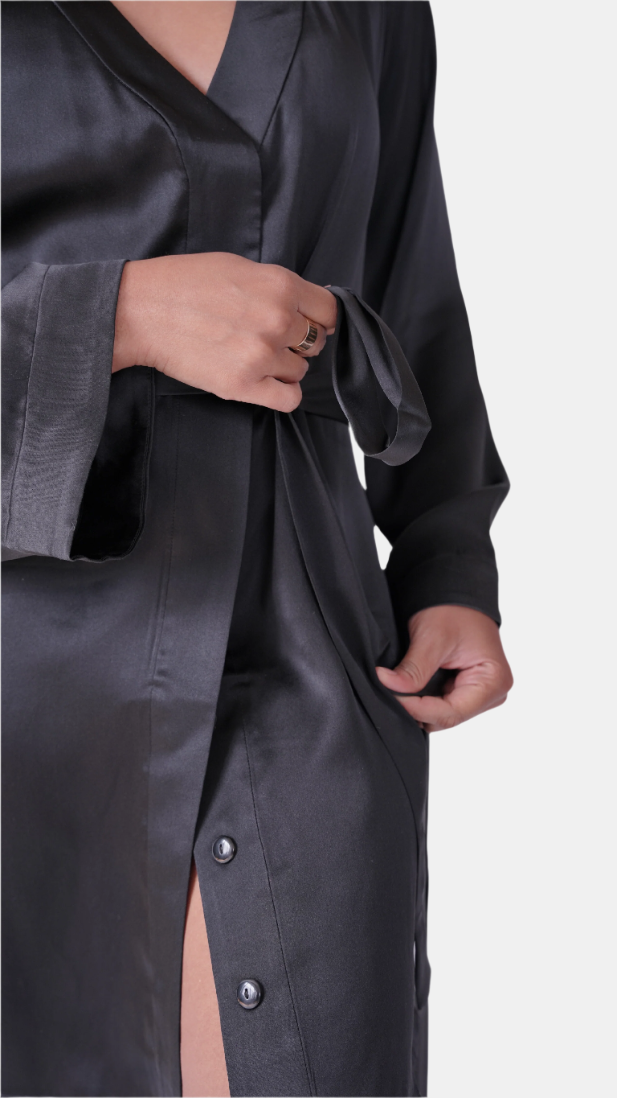 made in the softest washed silk charmeuse, this hidden button front shirt dress can be worn as a robe, pajama top or shirtdress, in and outside of the boudoir  belt loop is subtly and discretely hidden behind the back placket  complete with resting pockets  wear with a je mérite coordinating bottom or chemise  soft collar v-neck neckline subtle slits at sides removable belt sensual fit mini length  washed 100% silk charmeuse  designed and made in new york city, new york - available in 0/2-20/22