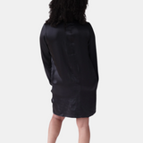 made in the softest washed silk charmeuse, this hidden button front shirt dress can be worn as a robe, pajama top or shirtdress, in and outside of the boudoir  belt loop is subtly and discretely hidden behind the back placket  complete with resting pockets  wear with a je mérite coordinating bottom or chemise  soft collar v-neck neckline subtle slits at sides removable belt sensual fit mini length  washed 100% silk charmeuse  designed and made in new york city, new york - available in 0/2-20/22
