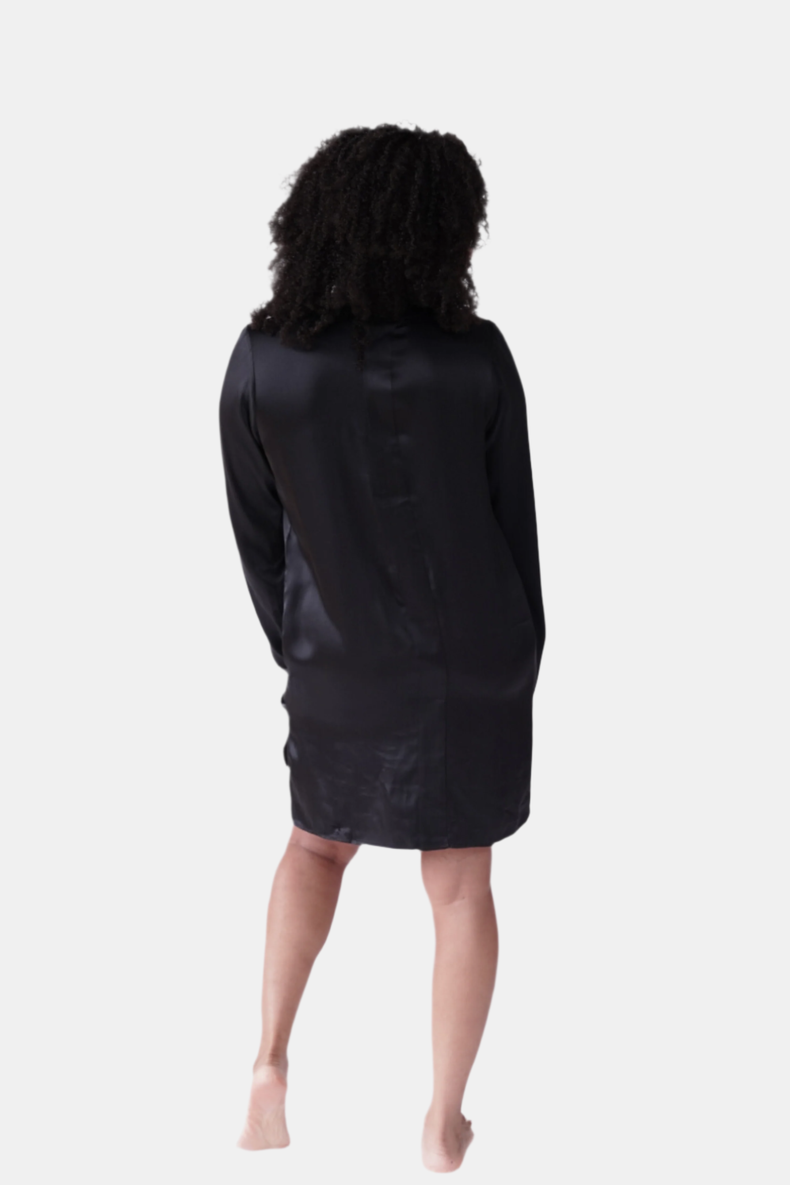 made in the softest washed silk charmeuse, this hidden button front shirt dress can be worn as a robe, pajama top or shirtdress, in and outside of the boudoir  belt loop is subtly and discretely hidden behind the back placket  complete with resting pockets  wear with a je mérite coordinating bottom or chemise  soft collar v-neck neckline subtle slits at sides removable belt sensual fit mini length  washed 100% silk charmeuse  designed and made in new york city, new york - available in 0/2-20/22
