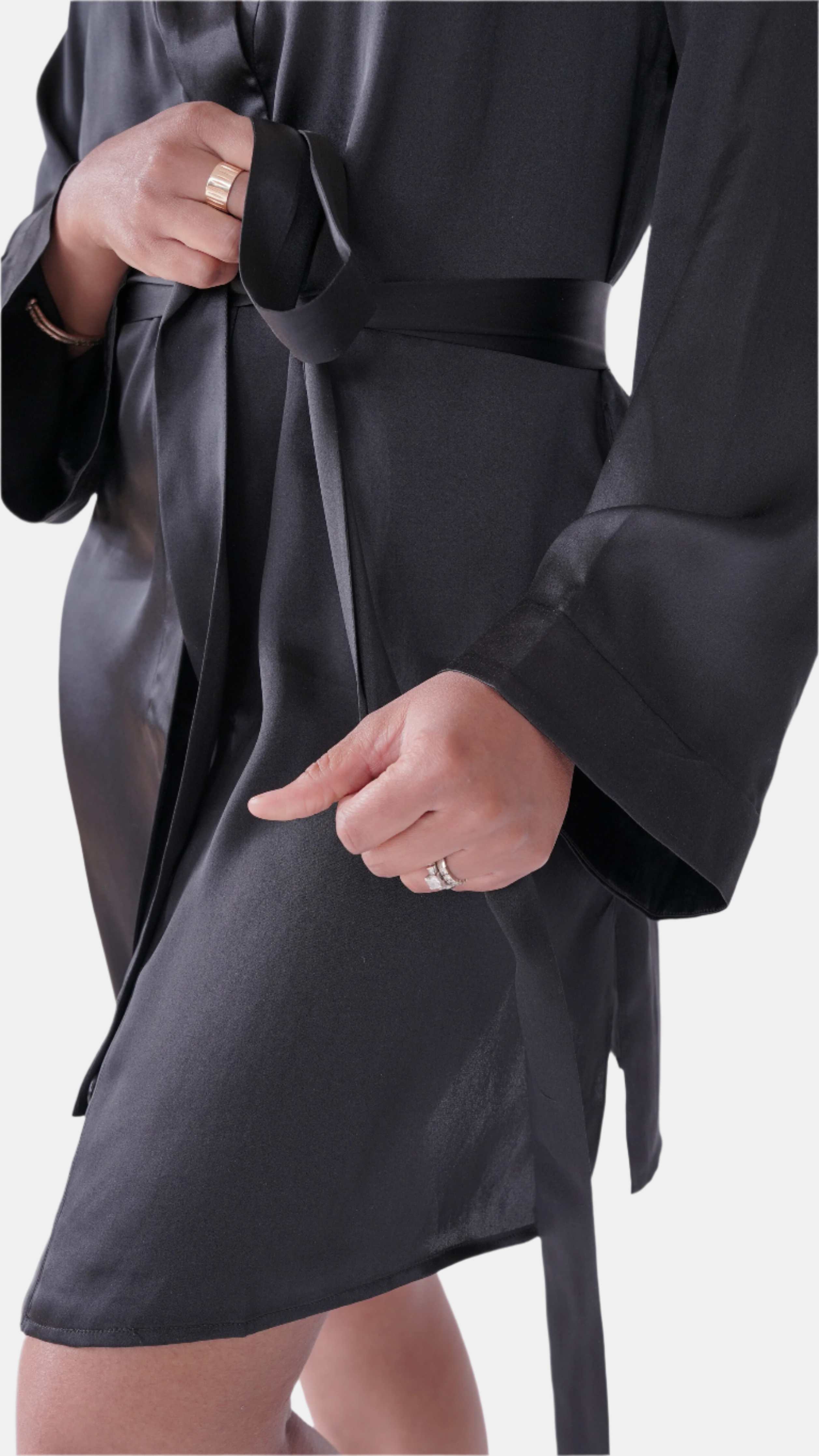 made in the softest washed silk charmeuse, this hidden button front shirt dress can be worn as a robe, pajama top or shirtdress, in and outside of the boudoir  belt loop is subtly and discretely hidden behind the back placket  complete with resting pockets  wear with a je mérite coordinating bottom or chemise  soft collar v-neck neckline subtle slits at sides removable belt sensual fit mini length  washed 100% silk charmeuse  designed and made in new york city, new york - available in 0/2-20/22