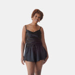 made in the softest washed silk charmeuse, our silk camisole is lined for added comfort and versatility  thin adjustable straps and slits at both sides  wear with a je mérite coordinating bottom, your favorite skirt or pant  v-neck neckline adjustable shoulder straps slits at both sides sensual fit  shell - washed 100% silk charmeuse lining - 100% polyester charmeuse designed and made in new york city, new york - available in 0/2-20/22