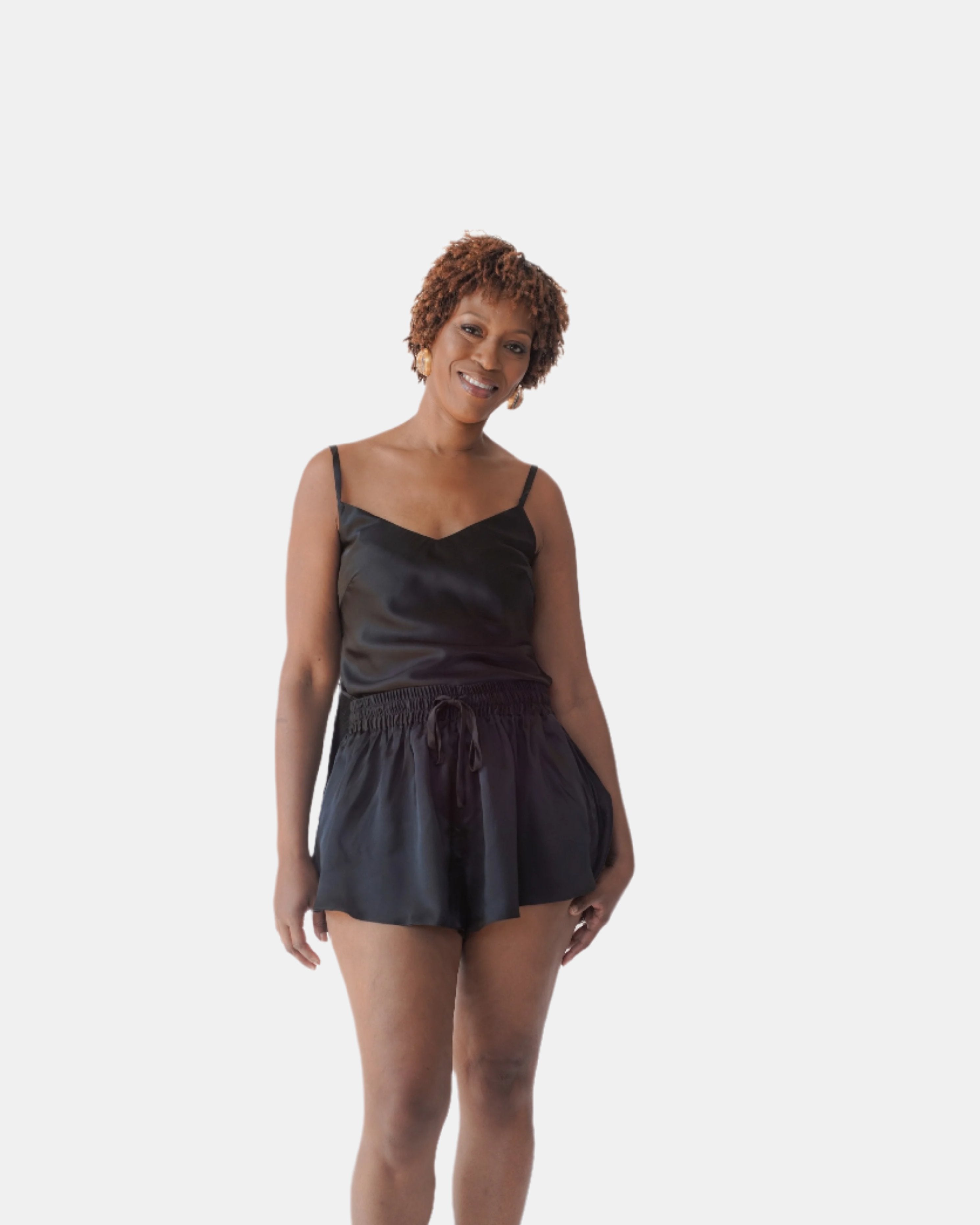 made in the softest washed silk charmeuse, our silk camisole is lined for added comfort and versatility  thin adjustable straps and slits at both sides  wear with a je mérite coordinating bottom, your favorite skirt or pant  v-neck neckline adjustable shoulder straps slits at both sides sensual fit  shell - washed 100% silk charmeuse lining - 100% polyester charmeuse designed and made in new york city, new york - available in 0/2-20/22