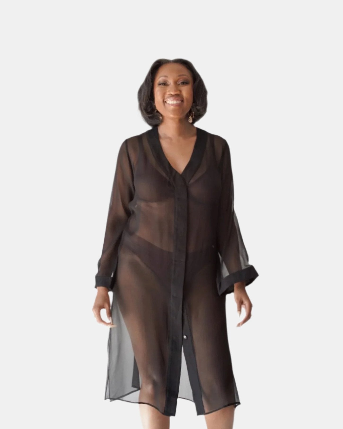 made from silk chiffon, this hidden button front nightdress can be worn open or fully buttoned, in and outside of the boudoir as a robe or a shirtdress (shirt dress)  belt loop is subtly and discretely hidden behind the back placket  complete with resting pockets  wear with a je mérite coordinating bottom or chemise  soft collar v-neck neckline subtle slits at sides sensual fit midi length 100% silk chiffon charmeuse designed and made in new york city, new york - available in 0/2-20/22