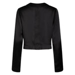 made in the softest washed silk charmeuse, this hidden button front cropped sleep shirt can be worn as a pajama top or shirt, in and outside of the boudoir wear with a je mérite coordinating bottom  soft collar v-neck neckline subtle slits at sides cropped just below the belly button  washed 100% silk charmeuse  designed and made in new york city, new york - available in 0/2-20/22