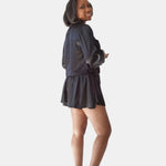 made in the softest washed silk charmeuse, this hidden button front cropped sleep shirt can be worn as a pajama top or shirt, in and outside of the boudoir wear with a je mérite coordinating bottom  soft collar v-neck neckline subtle slits at sides cropped just below the belly button  washed 100% silk charmeuse  designed and made in new york city, new york - available in 0/2-20/22