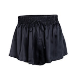 made in the softest washed silk charmeuse, this pleated short has an elastic waistband and drawstring closure  wear with a je mérite coordinating top or your favorite lingerie  wide elastic waist with drawstring closure sits at natural waist side slits slightly longer at the back sensual fit  washed 100% silk charmeuse  designed and made in new york city, new york - available in 0/2-20/22