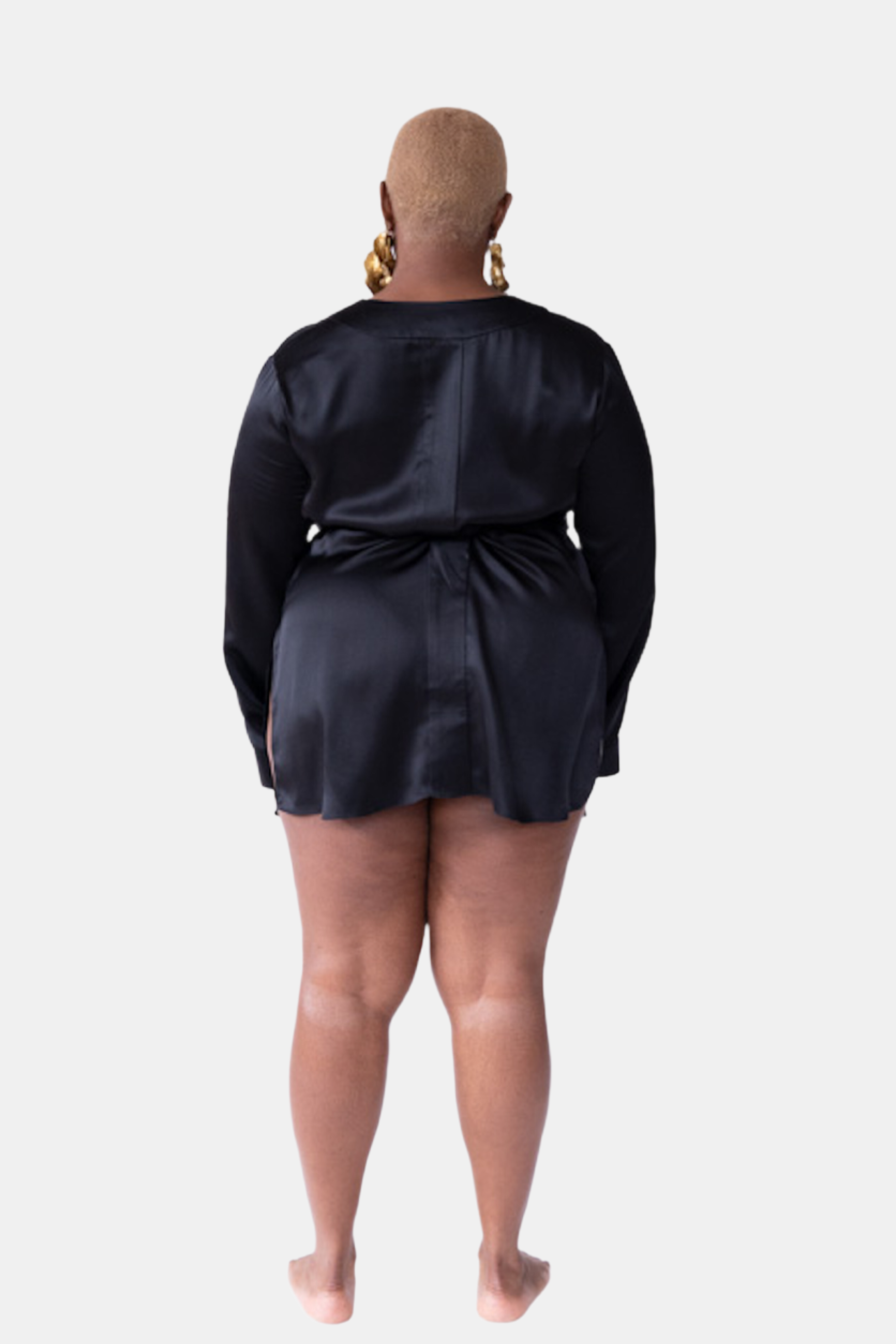 wear as a duster or a wrap robe wear as soft suiting, mini dress, blazer dress  slits at either side for access to pockets  made in the softest washed silk charmeuse  wear barefoot, with a soft fuzzy slipper for a night in, or a strappy heel for a night on the town  soft collar belt (removable at hidden back loop) relaxed fit mini length  washed 100% silk charmeuse designed and made in new york city, new york - available in 0/2-20/22