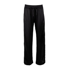 made in the softest washed silk charmeuse, this tuxedo pajama pant has an elastic waistband and drawstring closure  wear with a je mérite coordinating top or your favorite lingerie  wide elastic waist with drawstring closure pockets sits at natural waist tuxedo panels wide leg  washed 100% silk charmeuse designed and made in new york city, new york - available in 0/2-20/22