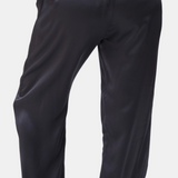 made in the softest washed silk charmeuse, this tuxedo pajama pant has an elastic waistband and drawstring closure  wear with a je mérite coordinating top or your favorite lingerie  wide elastic waist with drawstring closure pockets sits at natural waist tuxedo panels wide leg  washed 100% silk charmeuse designed and made in new york city, new york - available in 0/2-20/22