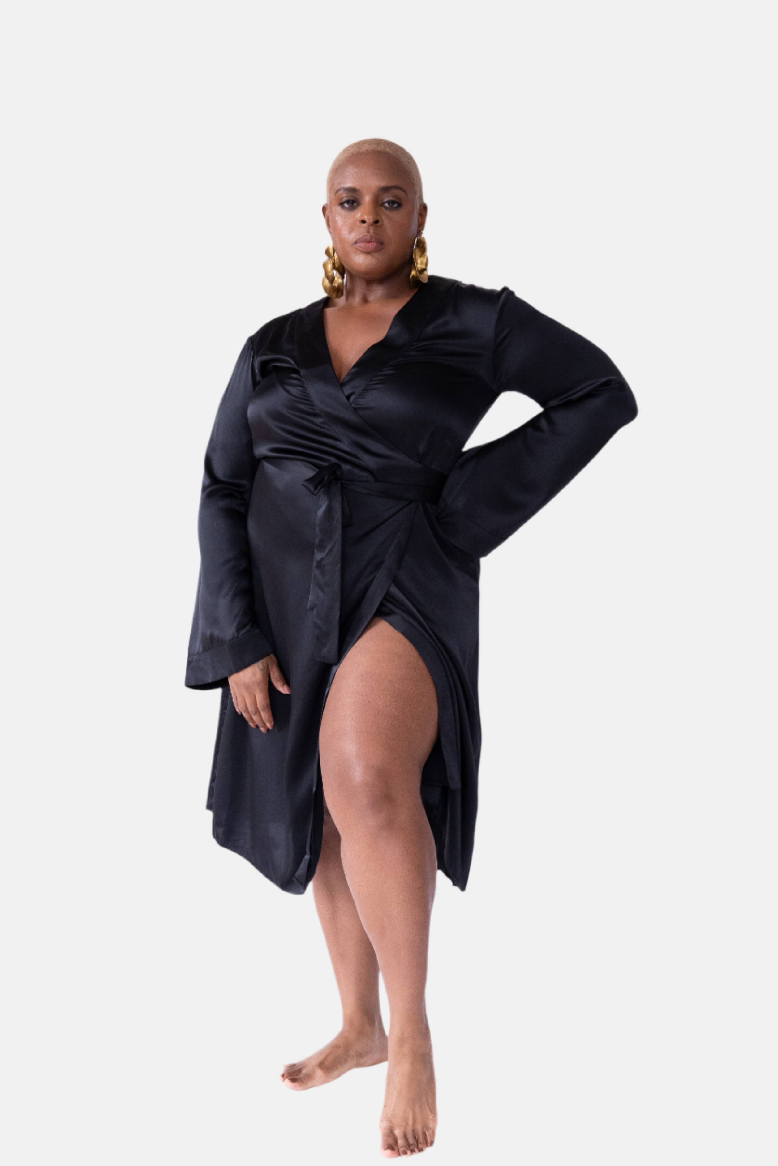made in the softest washed silk charmeuse, this double-breasted wrap robe has long bell sleeves  wear barefoot, with a soft fuzzy slipper for a night in, or a strappy heel for a night on the town  soft collar wrap belt (not removable) relaxed fit midi length  washed 100% silk charmeuse  designed in new york city, new york made in new york city, new york   size details - available in 0/2-20/22
