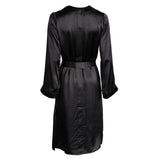 made in the softest washed silk charmeuse, this double-breasted wrap robe has long bell sleeves  wear barefoot, with a soft fuzzy slipper for a night in, or a strappy heel for a night on the town  soft collar wrap belt (not removable) relaxed fit midi length  washed 100% silk charmeuse  designed in new york city, new york made in new york city, new york   size details - available in 0/2-20/22