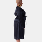 made in the softest washed silk charmeuse, this double-breasted wrap robe has long bell sleeves  wear barefoot, with a soft fuzzy slipper for a night in, or a strappy heel for a night on the town  soft collar wrap belt (not removable) relaxed fit midi length  washed 100% silk charmeuse  designed in new york city, new york made in new york city, new york   size details - available in 0/2-20/22
