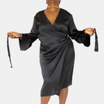 made in the softest washed silk charmeuse, this double-breasted wrap robe has long bell sleeves  wear barefoot, with a soft fuzzy slipper for a night in, or a strappy heel for a night on the town  soft collar wrap belt (not removable) relaxed fit midi length  washed 100% silk charmeuse  designed in new york city, new york made in new york city, new york   size details - available in 0/2-20/22
