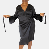 made in the softest washed silk charmeuse, this double-breasted wrap robe has long bell sleeves  wear barefoot, with a soft fuzzy slipper for a night in, or a strappy heel for a night on the town  soft collar wrap belt (not removable) relaxed fit midi length  washed 100% silk charmeuse  designed in new york city, new york made in new york city, new york   size details - available in 0/2-20/22